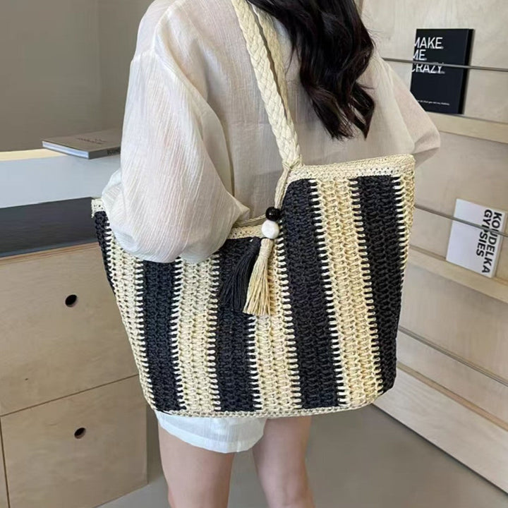Beach bag with cheerful stripes and tassel details Kalsten
