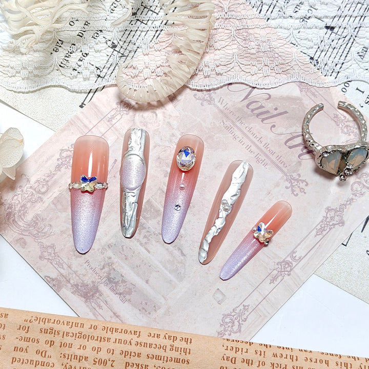 Artificial nails with elegant ombre design and jewelry accents Kalsten