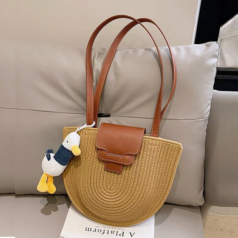 Fashionable Tote Bag Made of Woven Material with Playful Pendant Kalsten
