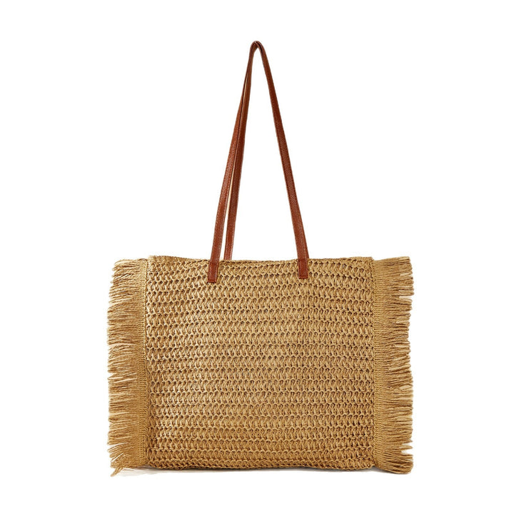 Beach bag made of raffia with fringed details Kalsten