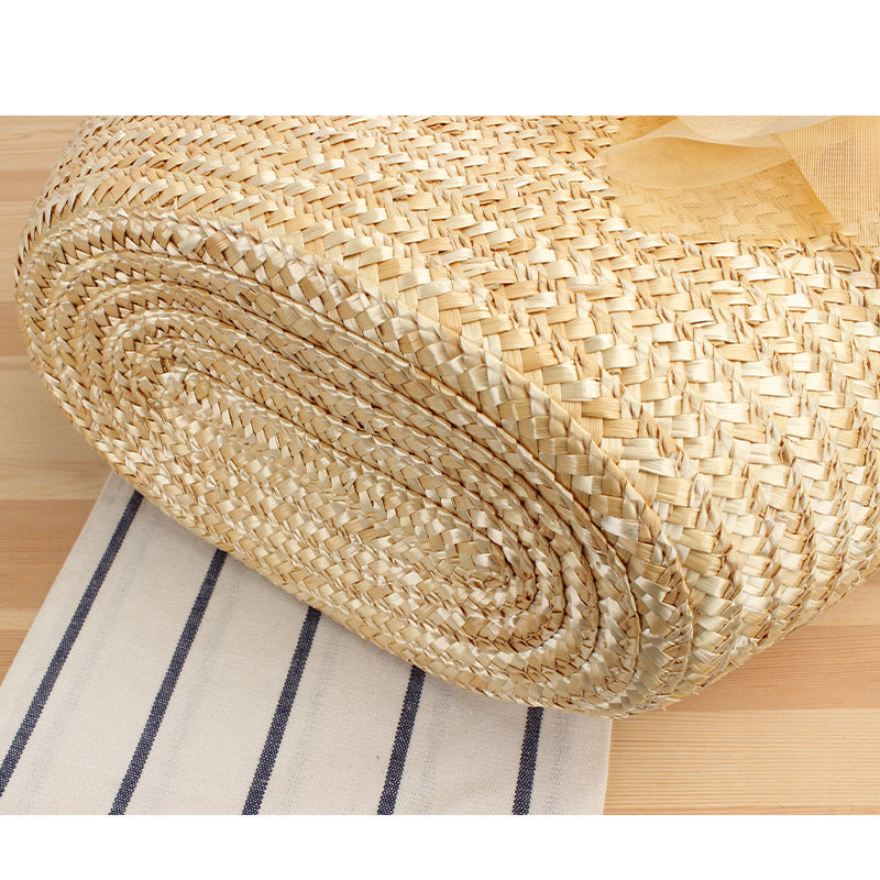 Elegant straw bag with floral accents Kalsten