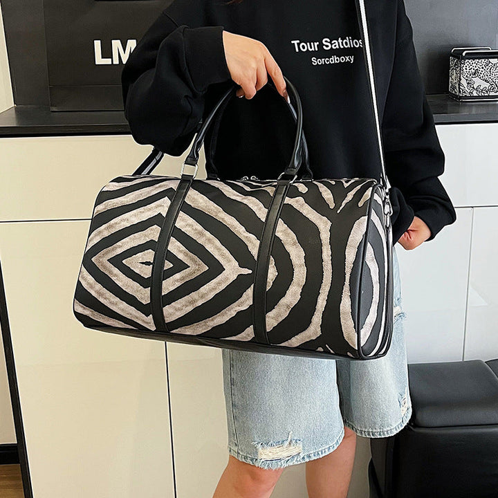 Sporty travel bag in trendy zebra pattern Kalsten