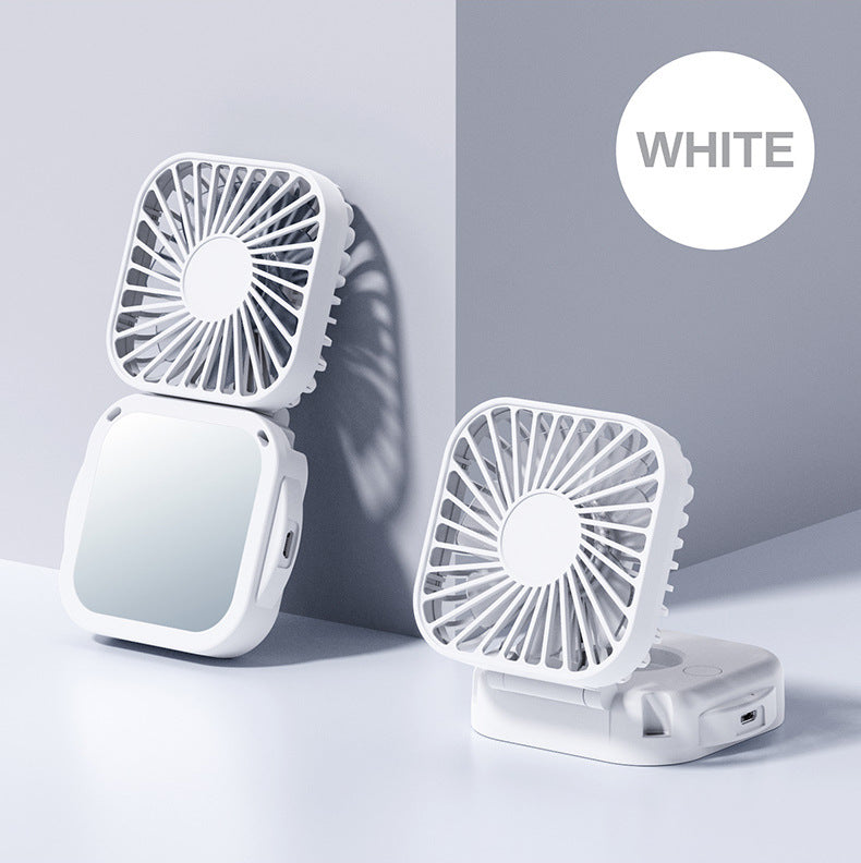 Unisex nan compact foldable clip on handheld desk fan with built in mirror adjustable tilt and USB rechargeable battery Kalsten