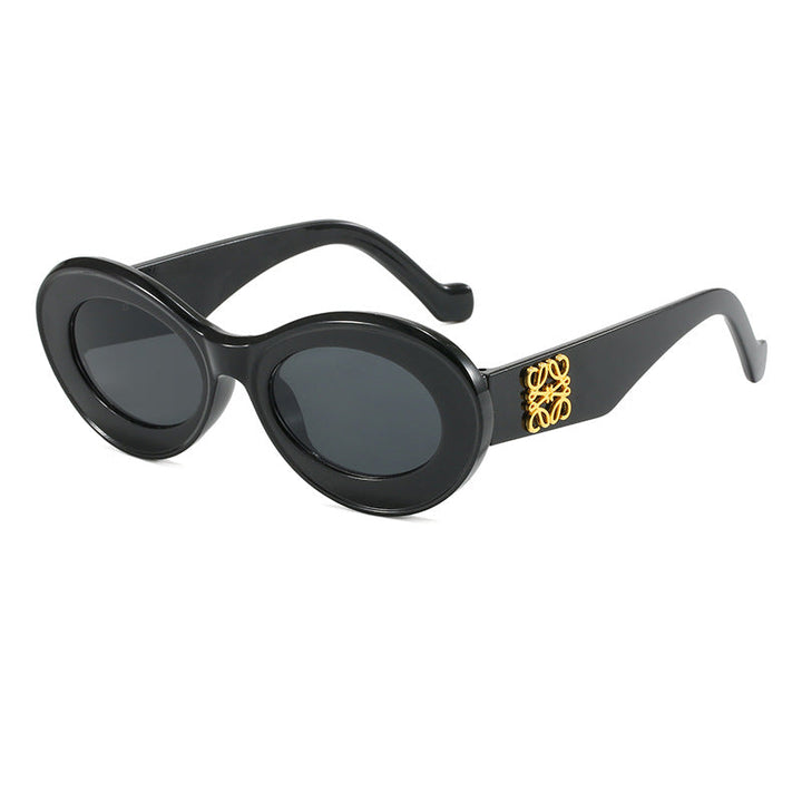 Women's fashionable sunglasses with oval frame and golden applications Kalsten