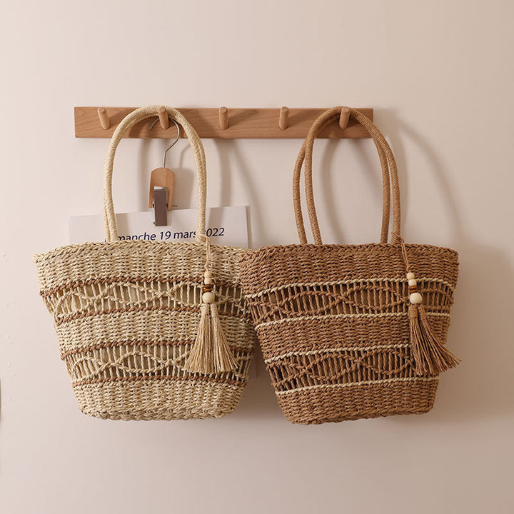 Handcrafted straw tote bag with decorative tassel detail Kalsten