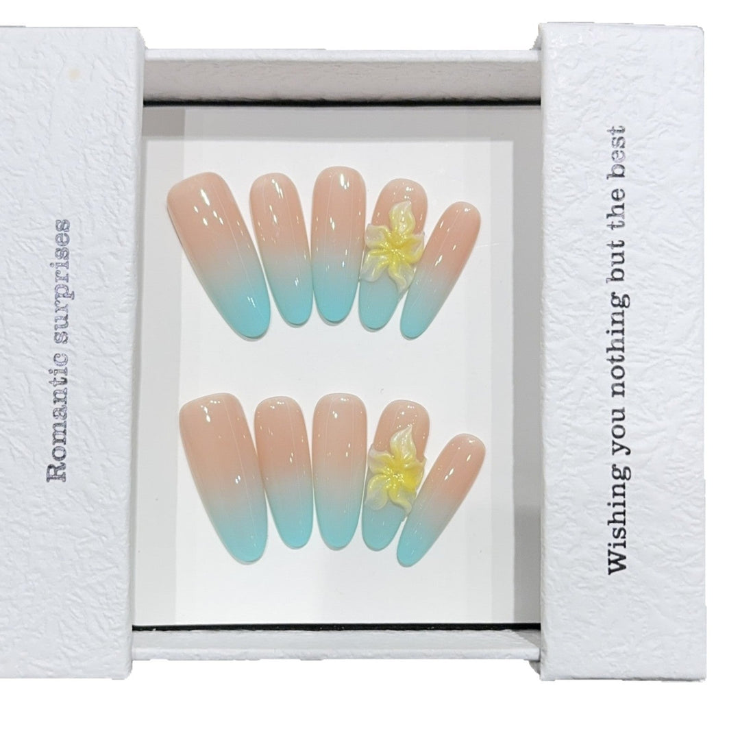 Artificial nails with enchanting ombre effect and floral accents Kalsten