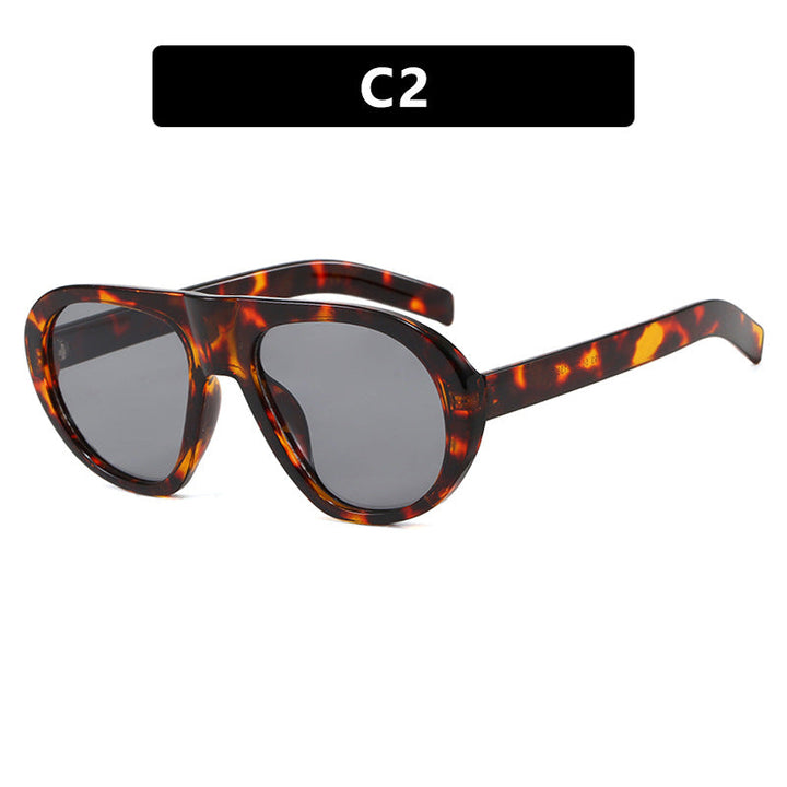 Women striking sunglasses with futuristic frame and sturdy design Kalsten