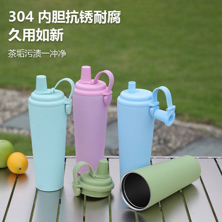 Women's ergonomic drinking cup with integrated carrying handle Kalsten