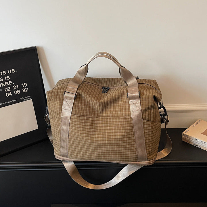 Sporty travel bag with practical storage and adjustable shoulder straps Kalsten