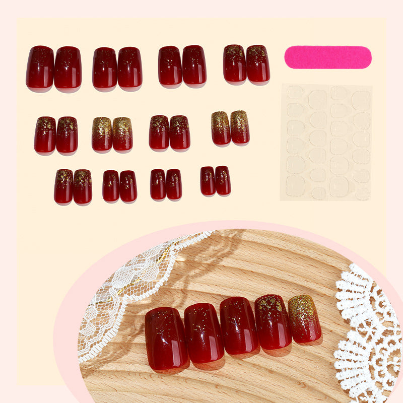 Elegant Press-On Nail Set with Glamorous Gold Glitter Accents Acalora