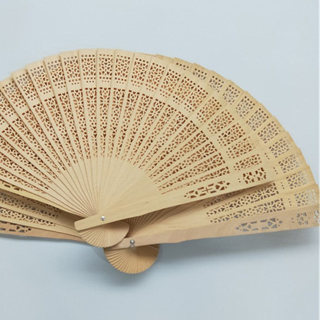 Ladies decorative and high-quality hand fan made of filigree wood Kalsten