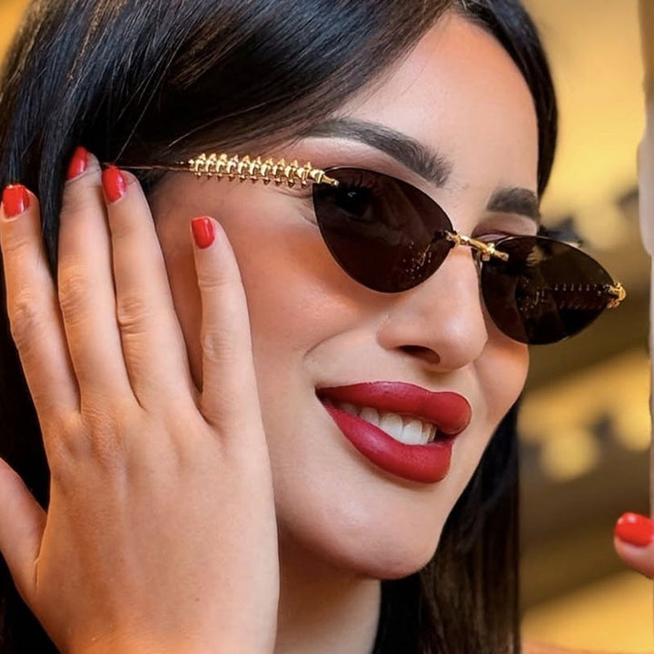 Women's sunglasses in modern, geometric design with stylish metal frame and UV protection Kalsten