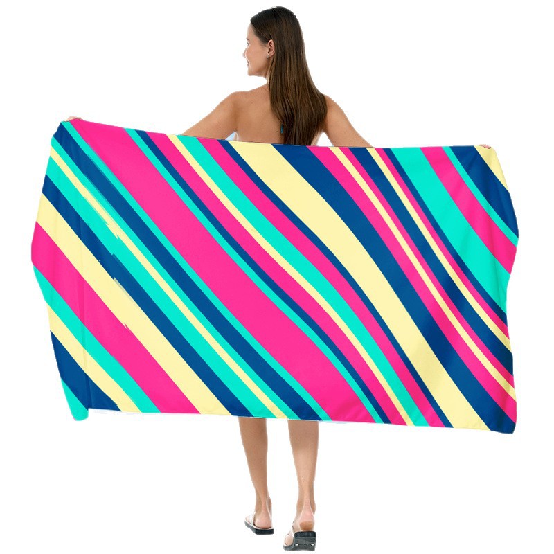 Beach towel with vibrant gradient color and stylish striped design Kalsten
