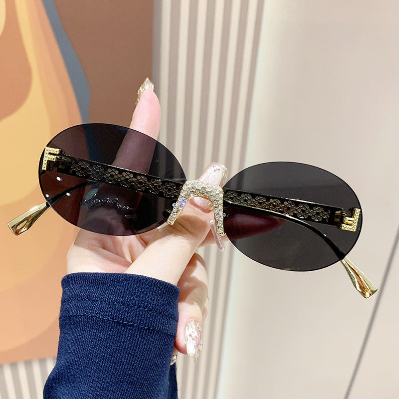 Women's sunglasses with glittering frame and oval lenses Kalsten