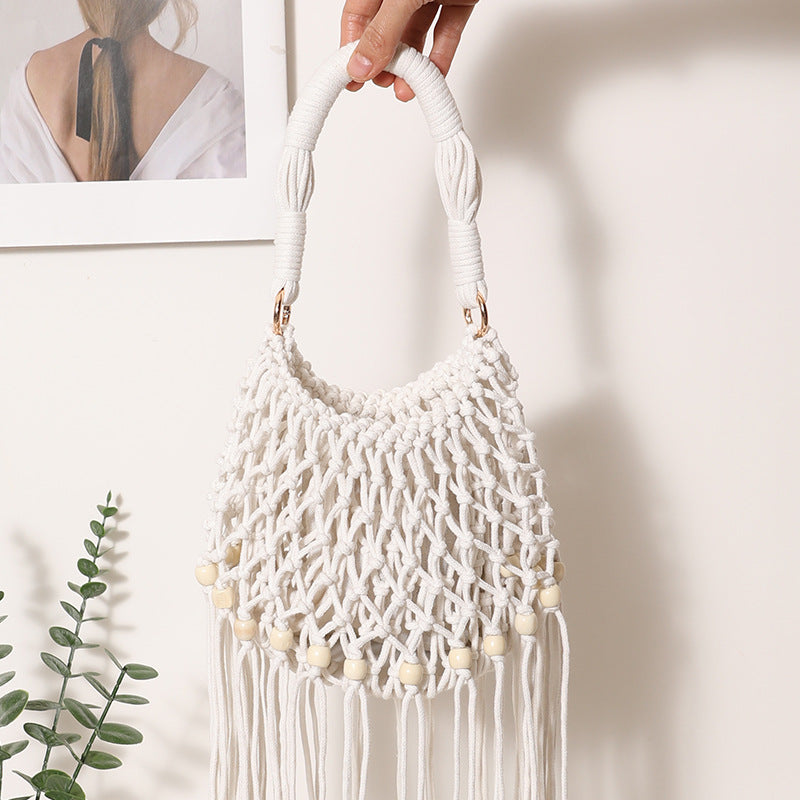 Macrame bag with decorative fringes and wooden beads Kalsten