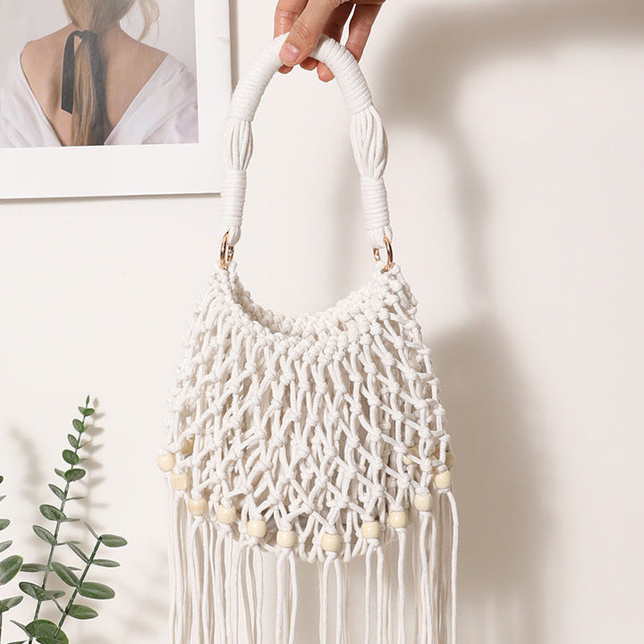 Macrame bag with decorative fringes and wooden beads Kalsten
