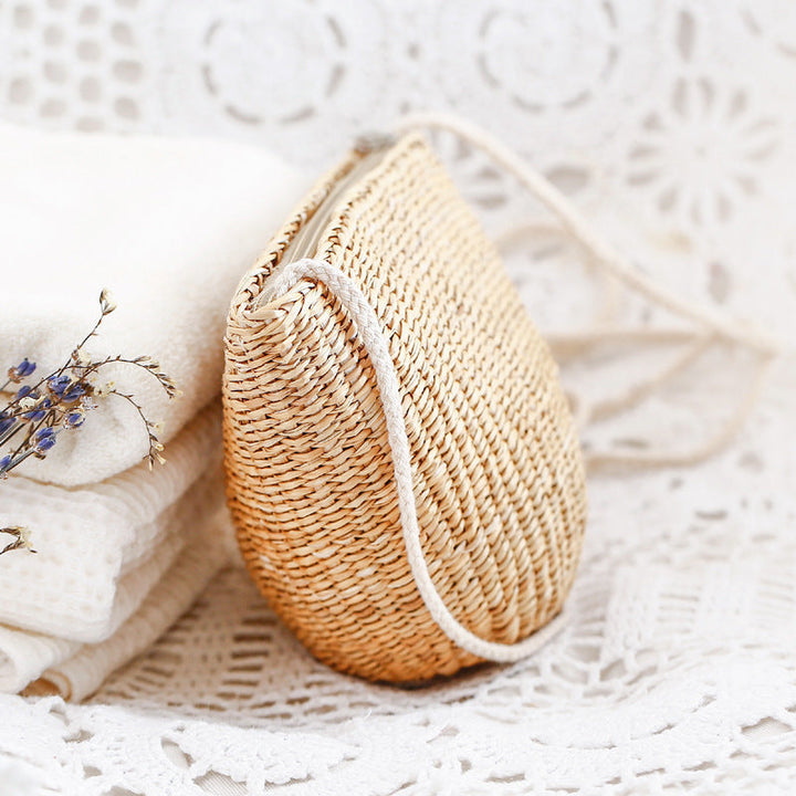 Handcrafted basket bag in unique half-moon design Kalsten