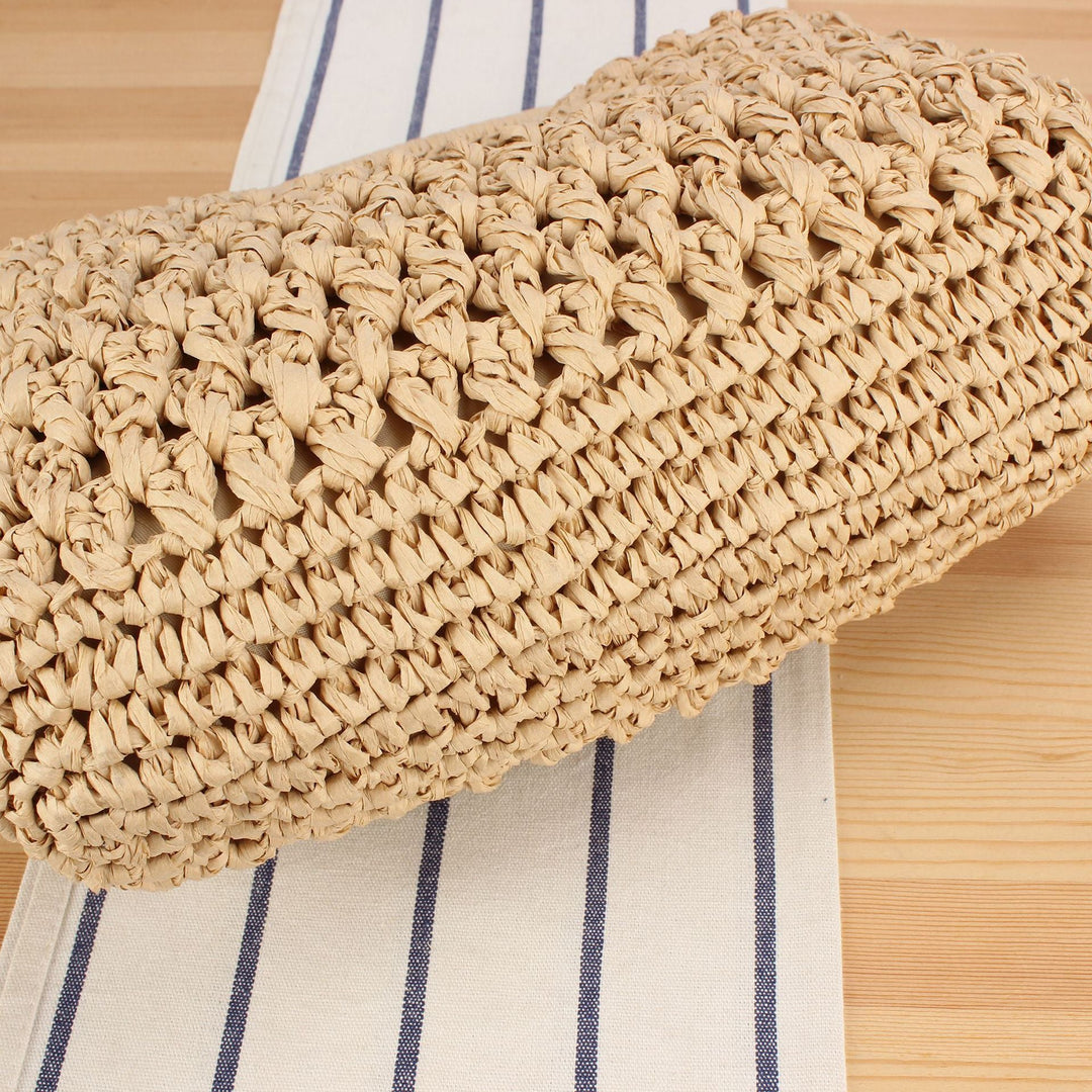 Fine straw shoulder bag with elegant chain accents Kalsten