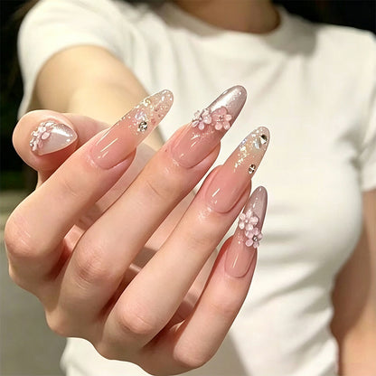 Nail art set with floral 3D applications and glitter accents Acalora