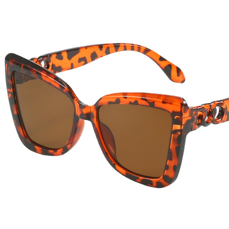 Ladies modern cat-eye sunglasses with clear frame and UV protection Kalsten