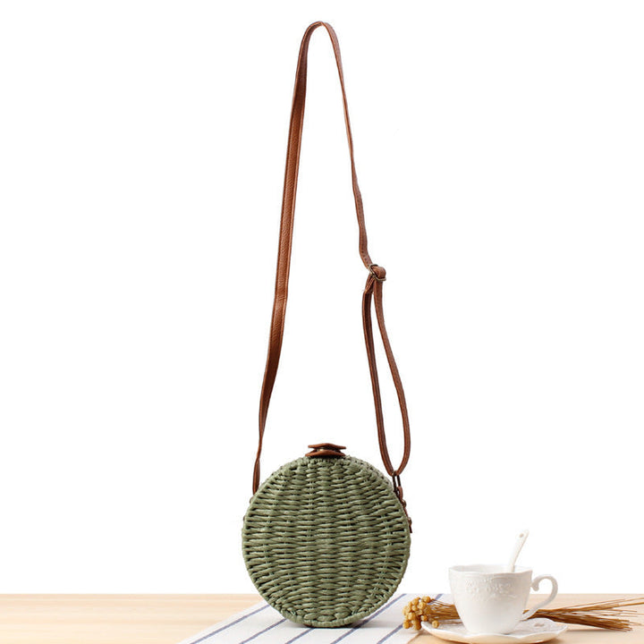 Round basket bag with leather accents Kalsten