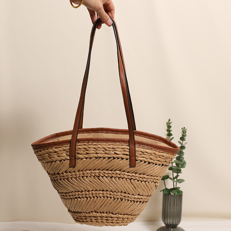 Braided basket bag with innovative leather handles Kalsten