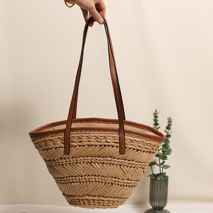 Braided basket bag with innovative leather handles Kalsten