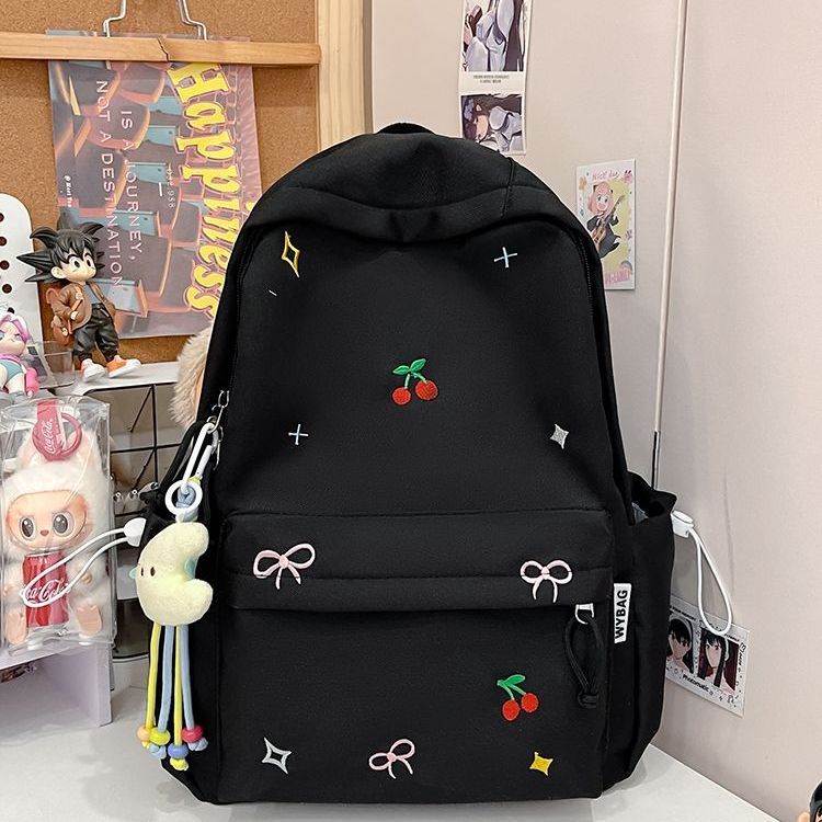 Playful backpack with embroidery Kalsten