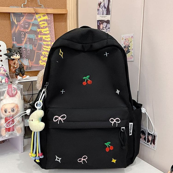 Playful backpack with embroidery Kalsten