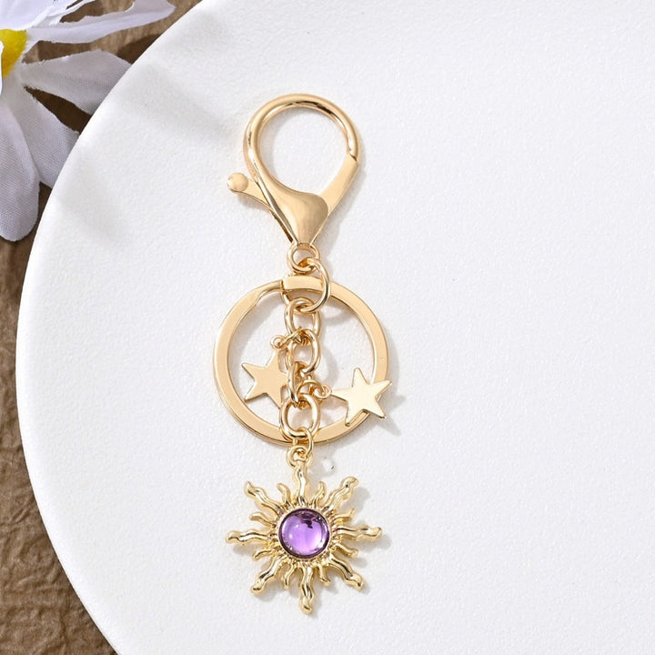 Keychain with Sparkling Sun Motif Kalsten