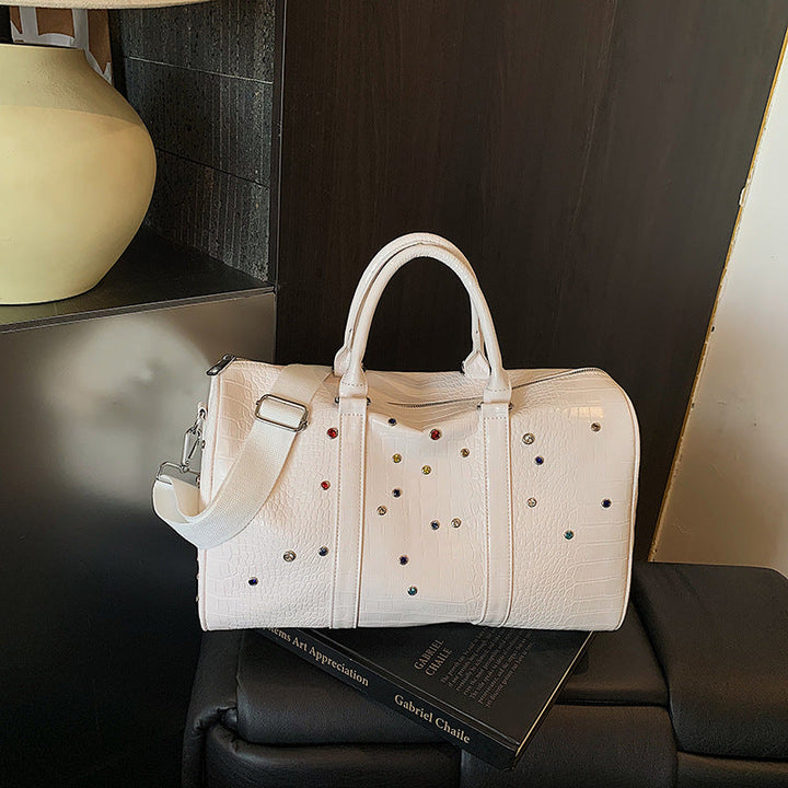 Fashionable travel bag with structured surface and versatile interior Kalsten