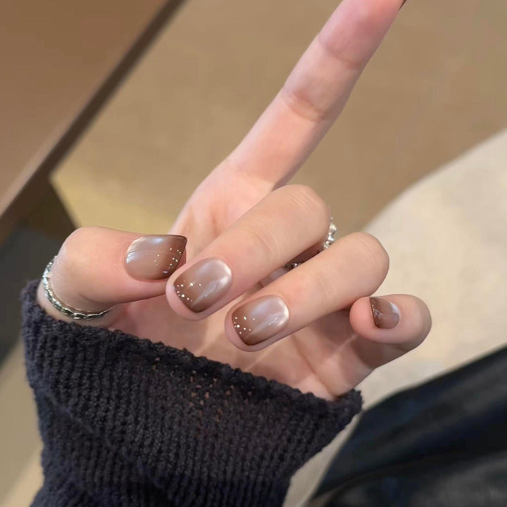 Artificial nails with elegant gradient color and glitter elements Kalsten