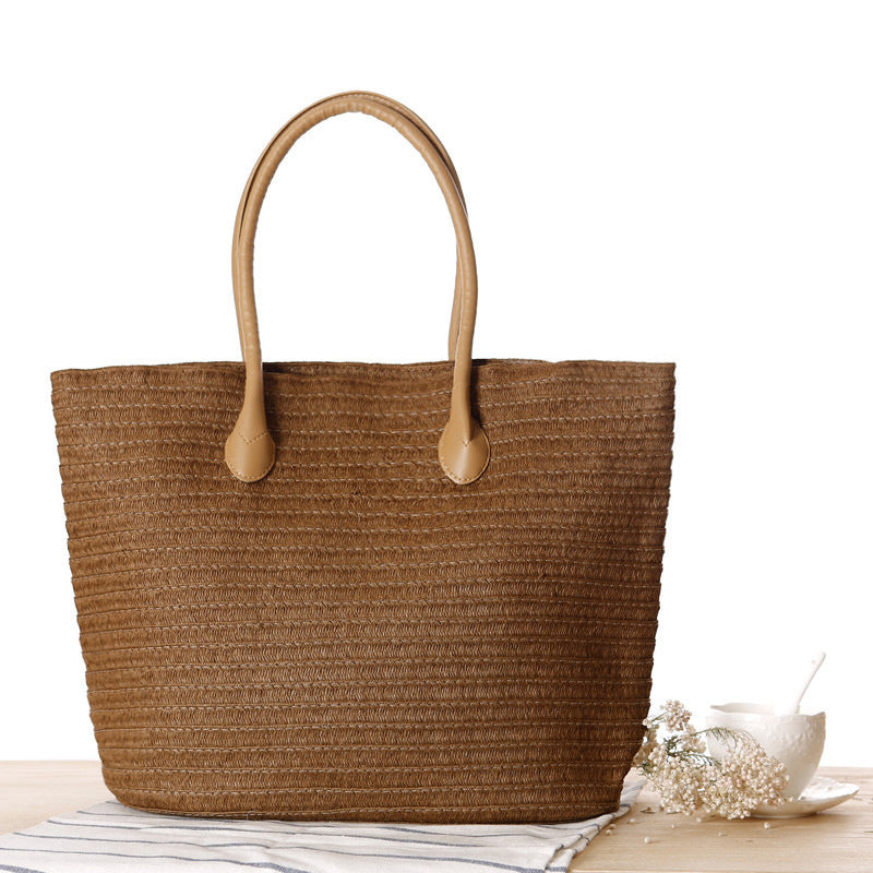Spacious straw shopper with leather carrying handles Kalsten