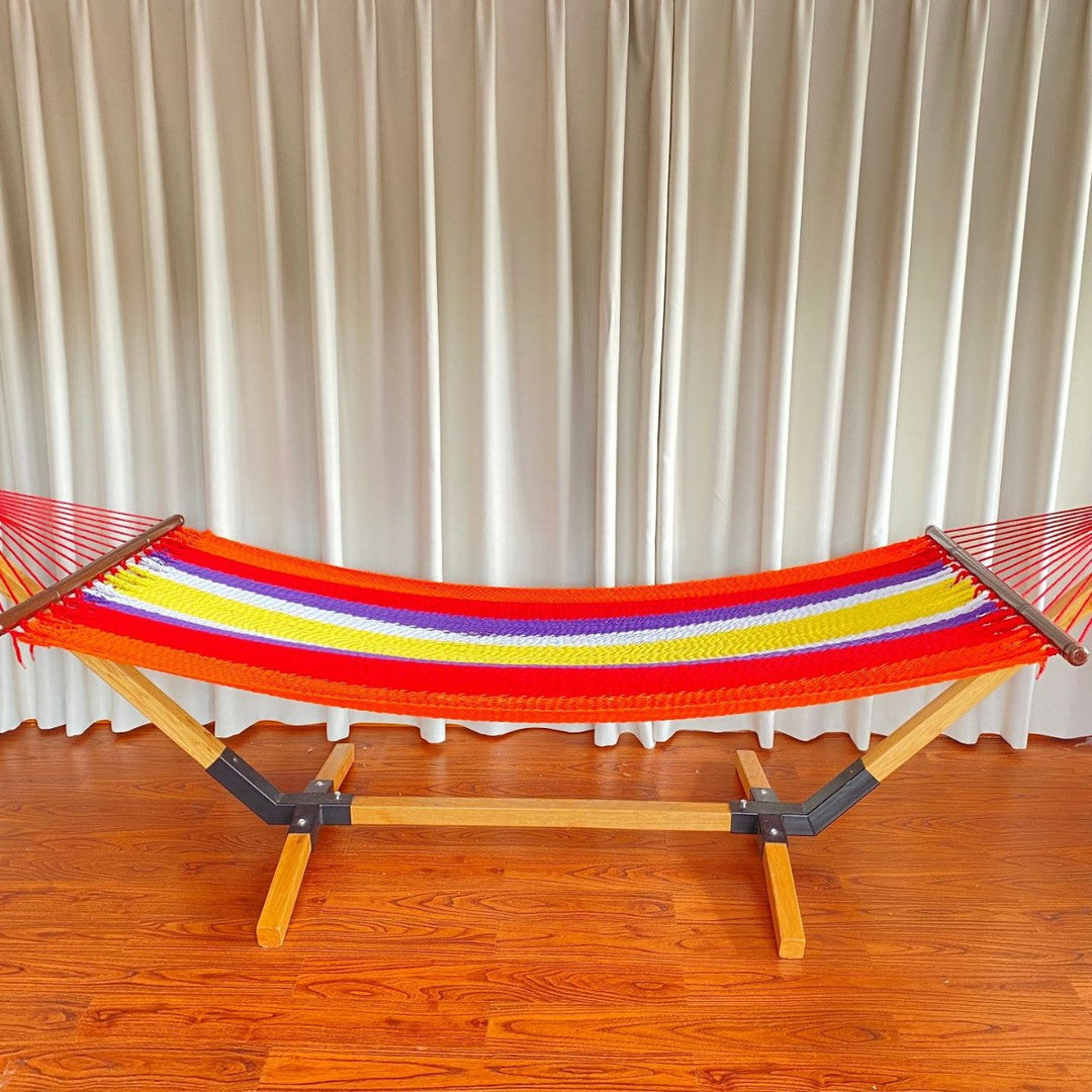 Woven cotton hammock with wooden spreader bars and freestanding stand Kalsten