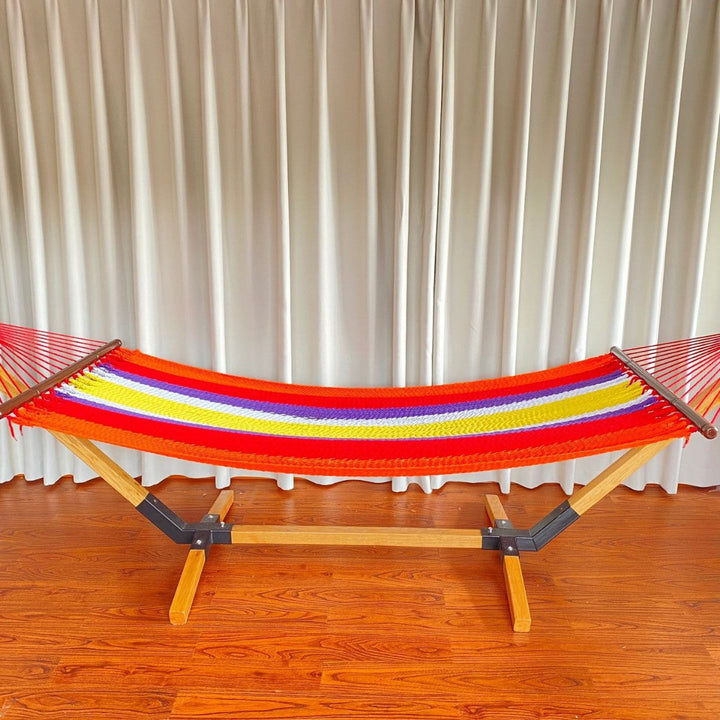Woven cotton hammock with wooden spreader bars and freestanding stand Kalsten