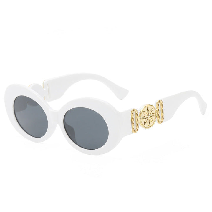 Ladies fashionable sunglasses with striking golden accents Kalsten