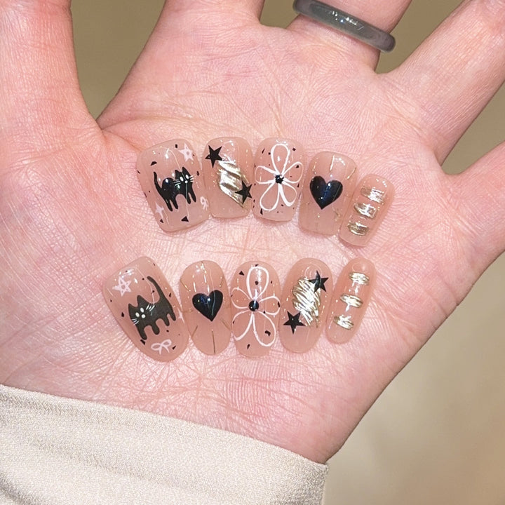 Artificial nails with unique cat and star design Kalsten