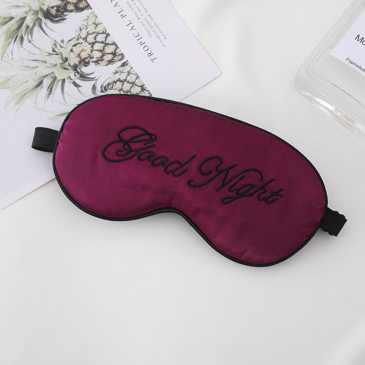 Unisex embroidered contoured sleep mask with decorative text embroidery and adjustable elastic band Kalsten