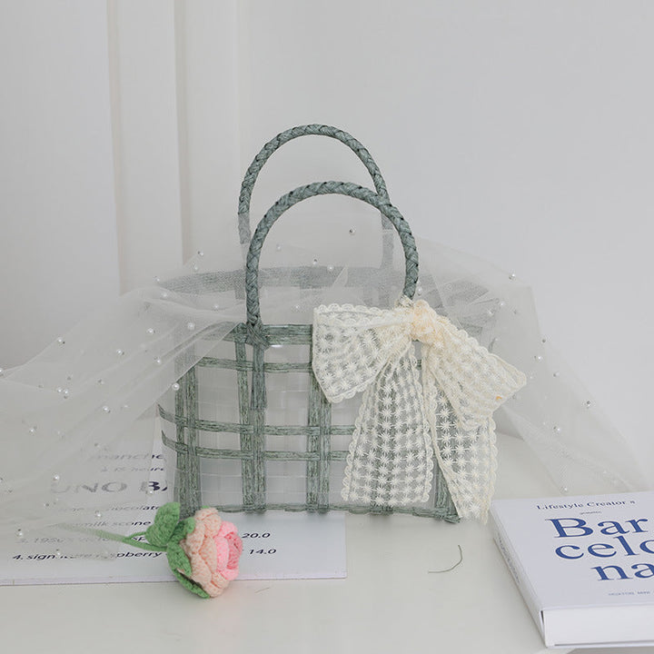 Handcrafted basket bag with elegant bow applique Kalsten