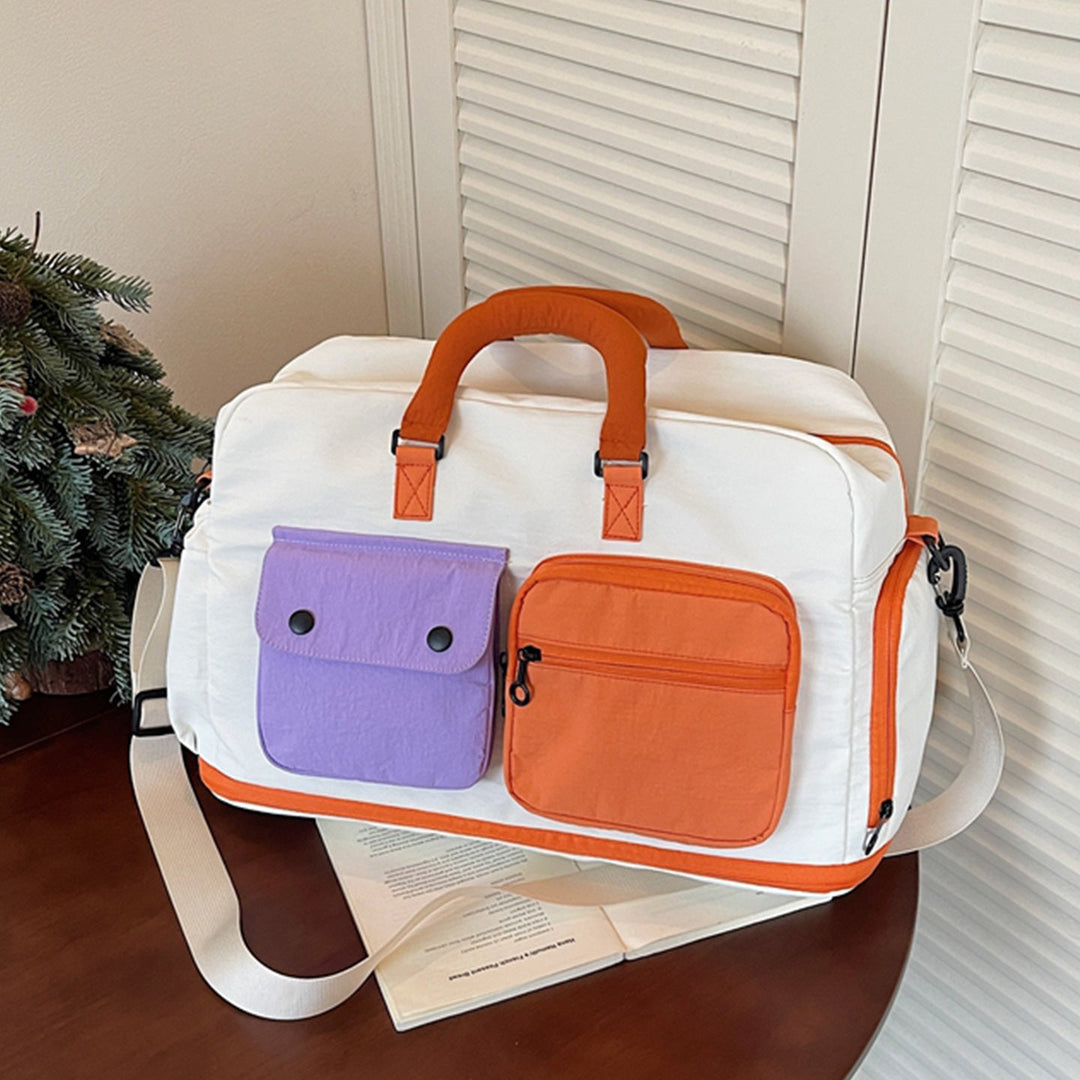 Sporty travel bag with multifunctional outer pockets Kalsten
