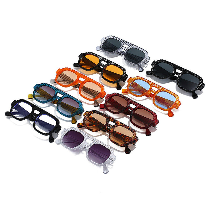 Ladies fashionable sunglasses in futuristic design with textured frame Kalsten