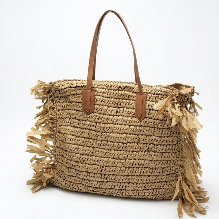 Beach bag with fringed design and sturdy leather handles Kalsten