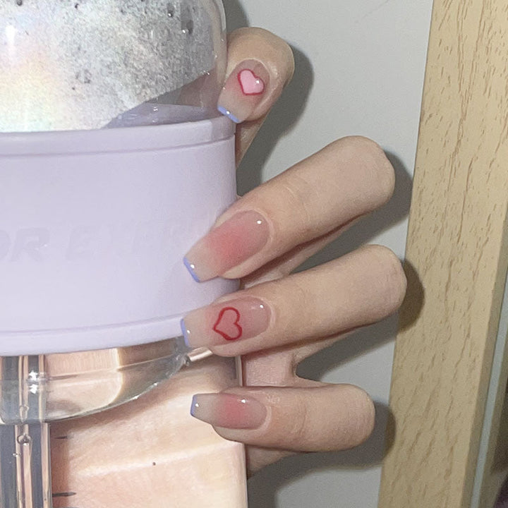Artificial nails with heart accent and glamorous decorations Kalsten