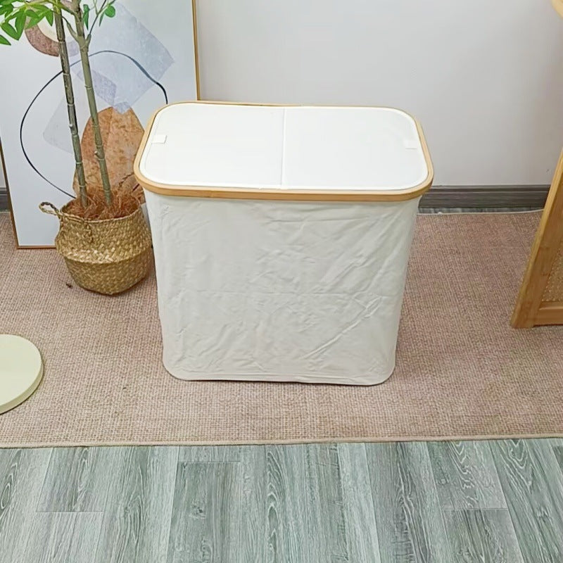 Robust laundry container with practical lid and inner pocket Acalora