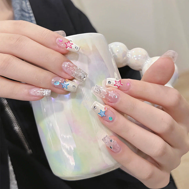 Glamorous artificial nails with heart accents Kalsten