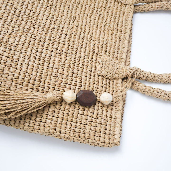 Handmade basket bag with unique fringe pendant Kalsten