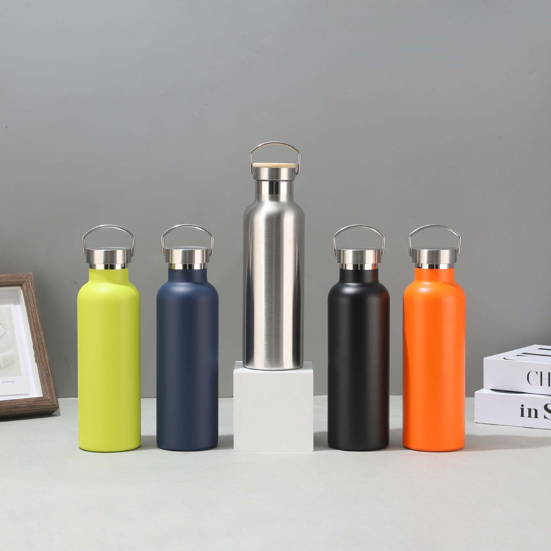 Women's stainless steel insulated drinking bottle with sustainable bamboo lid Kalsten