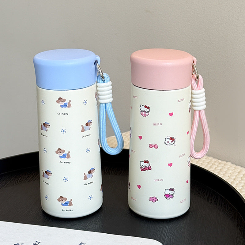 Women’s insulated drinking bottle with practical carrying strap and playful design Kalsten