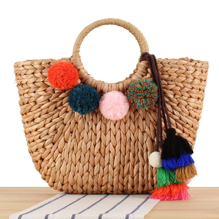 Basket bag with colorful pompons and carrying straps Kalsten