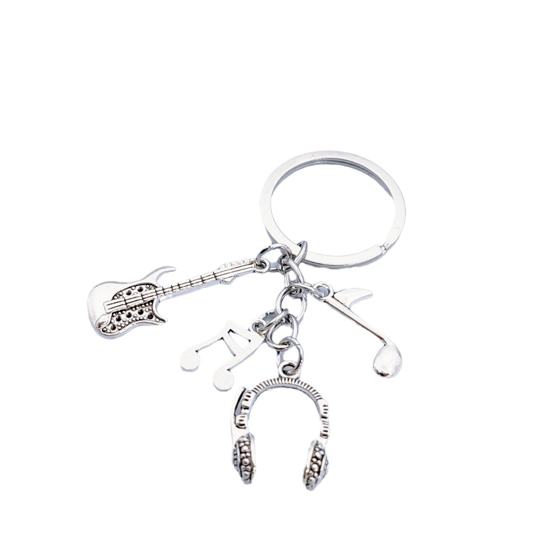 Keychain with musical instruments motifs Kalsten